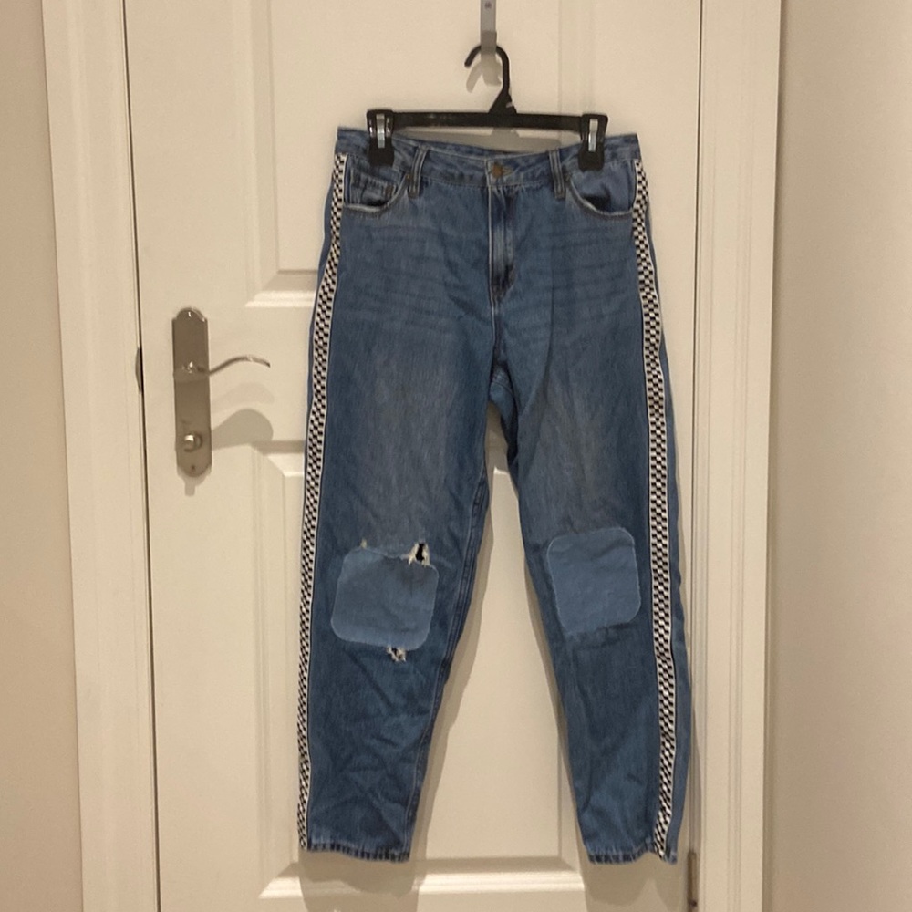 Mom jeans with patches and checked lining